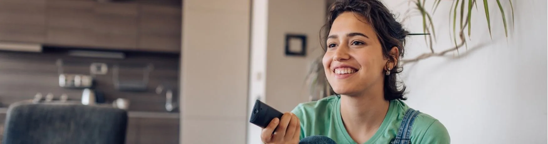 Person relaxing at home after securing a home loan